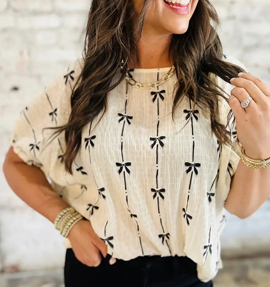 Cream w/ black bows